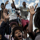 Students in Cape Town, South Africa, cheer after the statue of British colonialist Cecil Rhodes is removed from the University of Cape Town April 9, 2015. The statue was removed as a result of a monthlong protest by students saying the statue glorified someone “who exploited black labor and stole land from indigenous people.”
Charlie Shoemaker/Getty Images